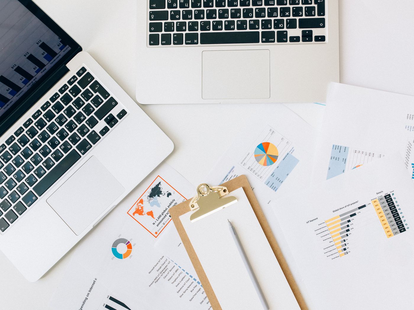 Financial charts and figures laid out on a desk
